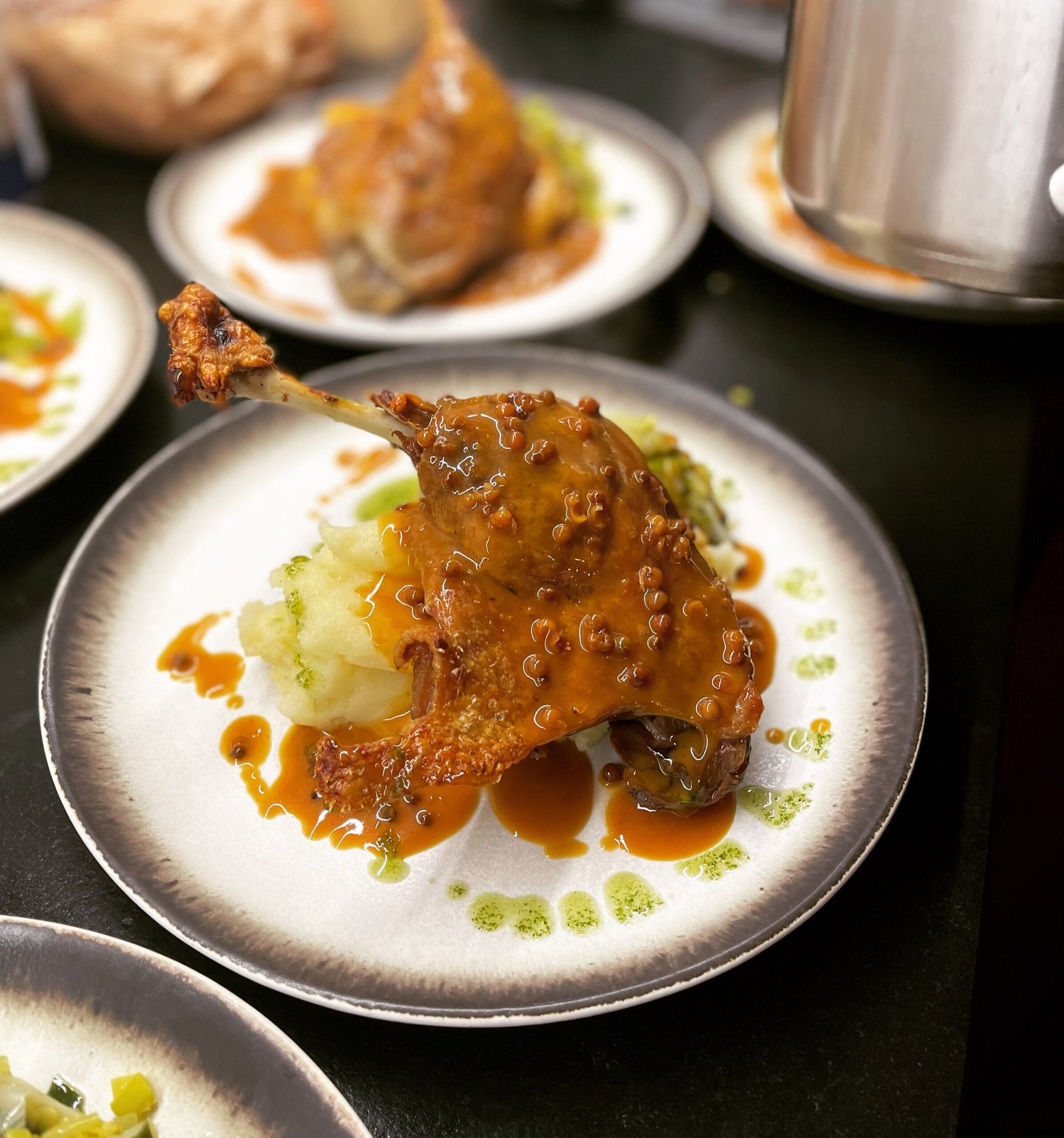 Confit duck with peppercorn sauce
